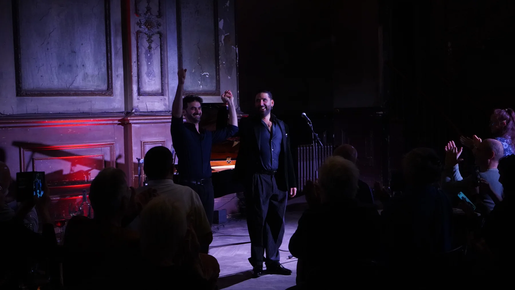 Rolando Guy and Gastón Efficace receiving applause